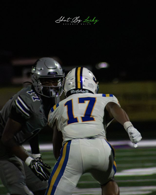 A back breaking away from the player marking him